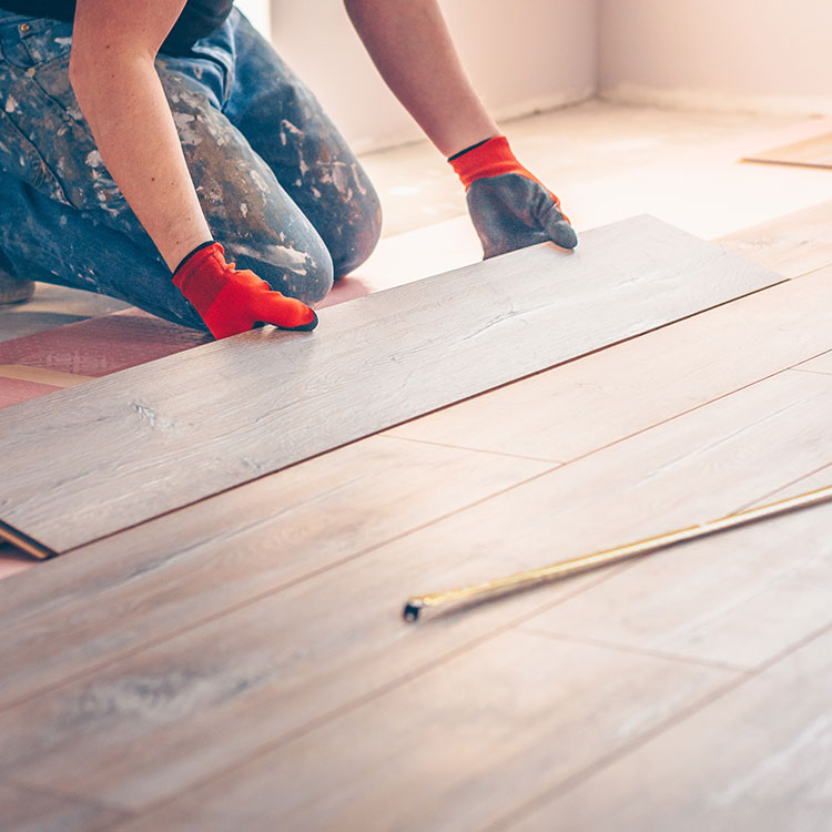 Picture of flooring being installed.