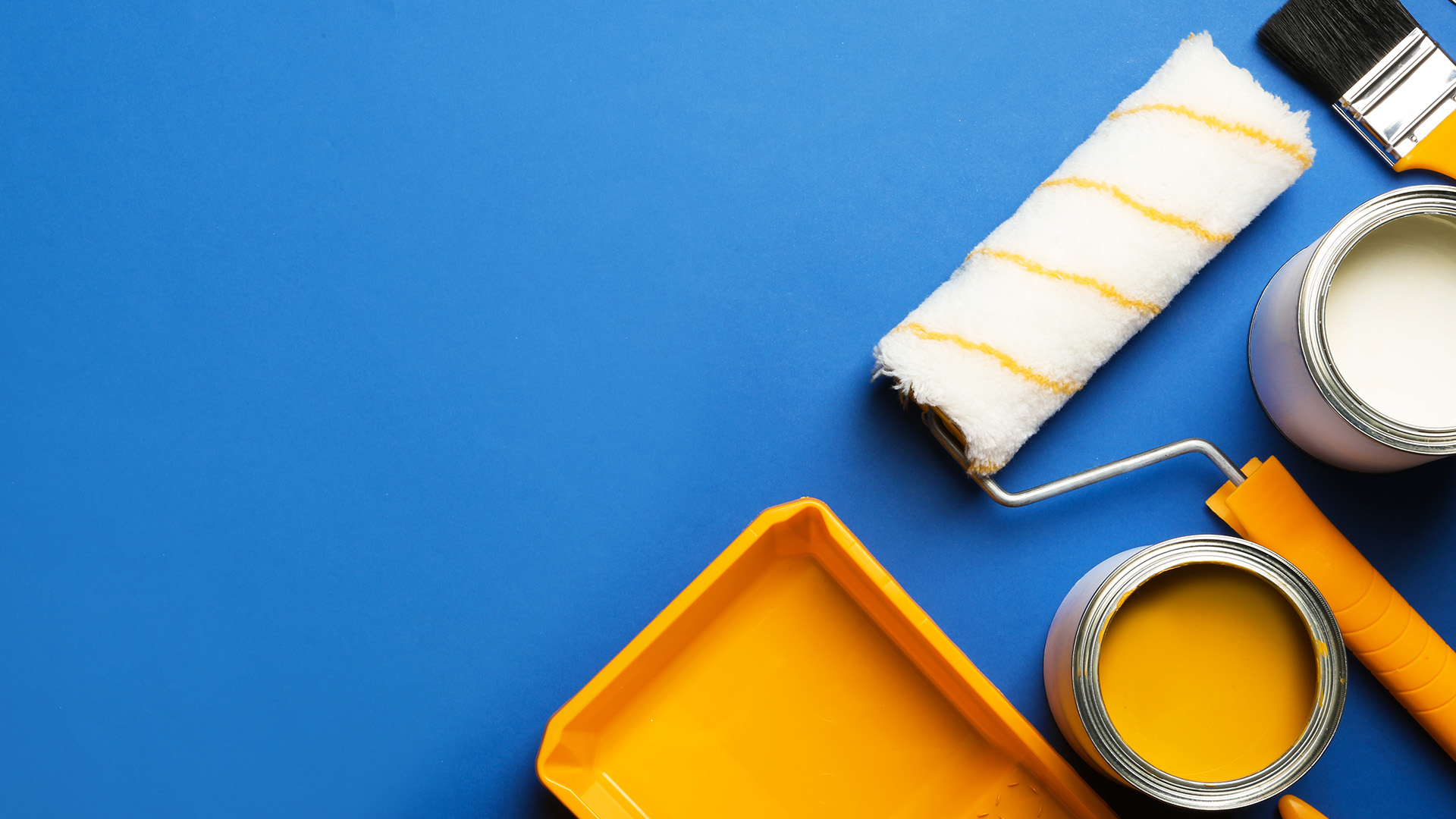 An image of painting supplies on a blue background.